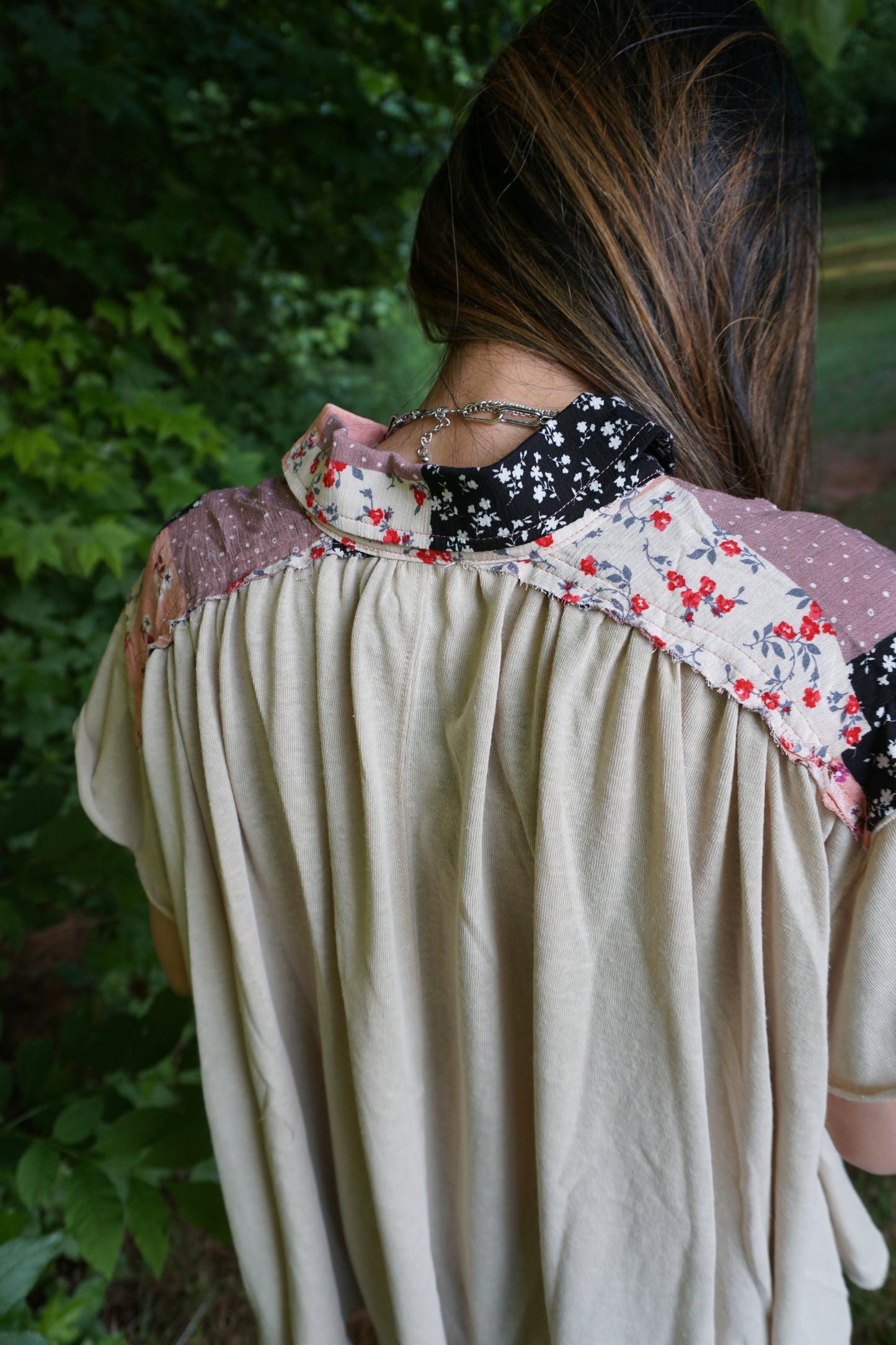 Top con vuelo floral